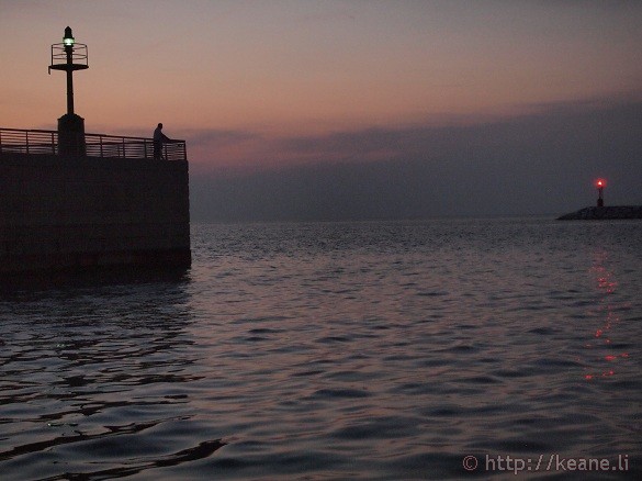 Beacons and Silhouette - The Rimini pier at night