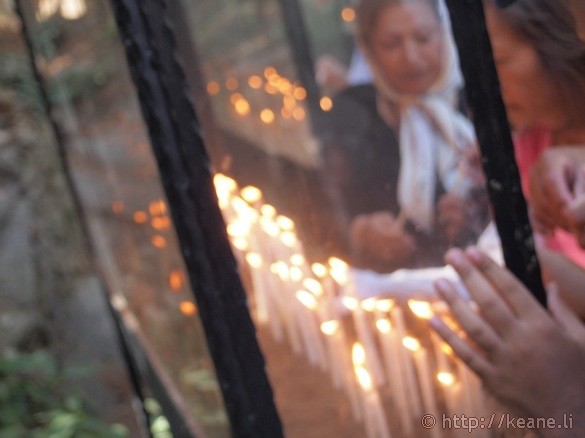 Lighting Candles at the House of the Virgin Mary in Turkey (photo)