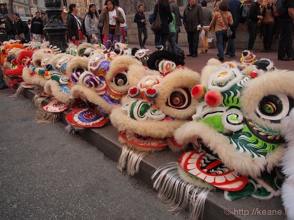 Chinese lion heads along Market Street before the Chinese New Year parade