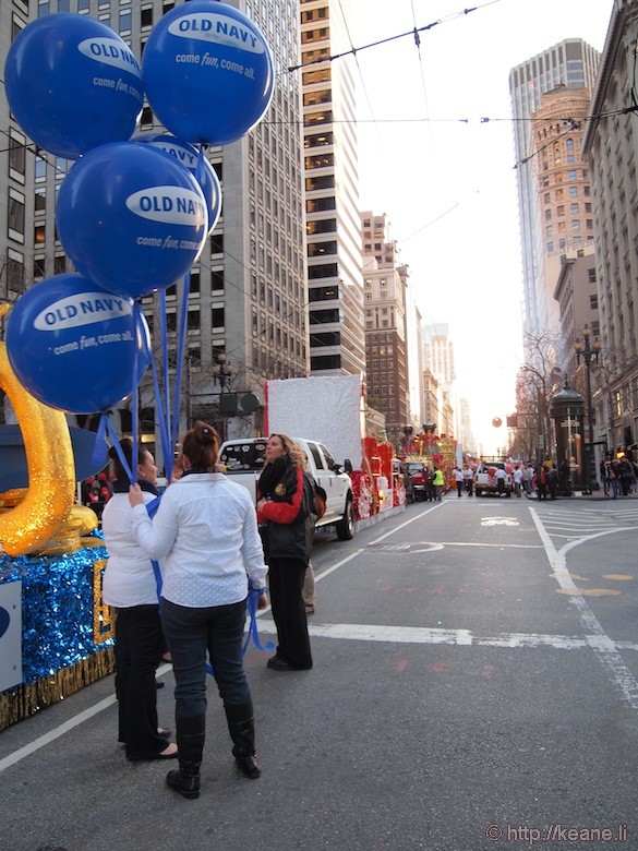 Old Navy balloons on Market Street during sunset before the Chinese New Year parade