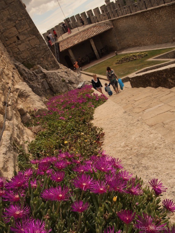 Flowers and Courtyard Inside Guaita Castle in San Marino